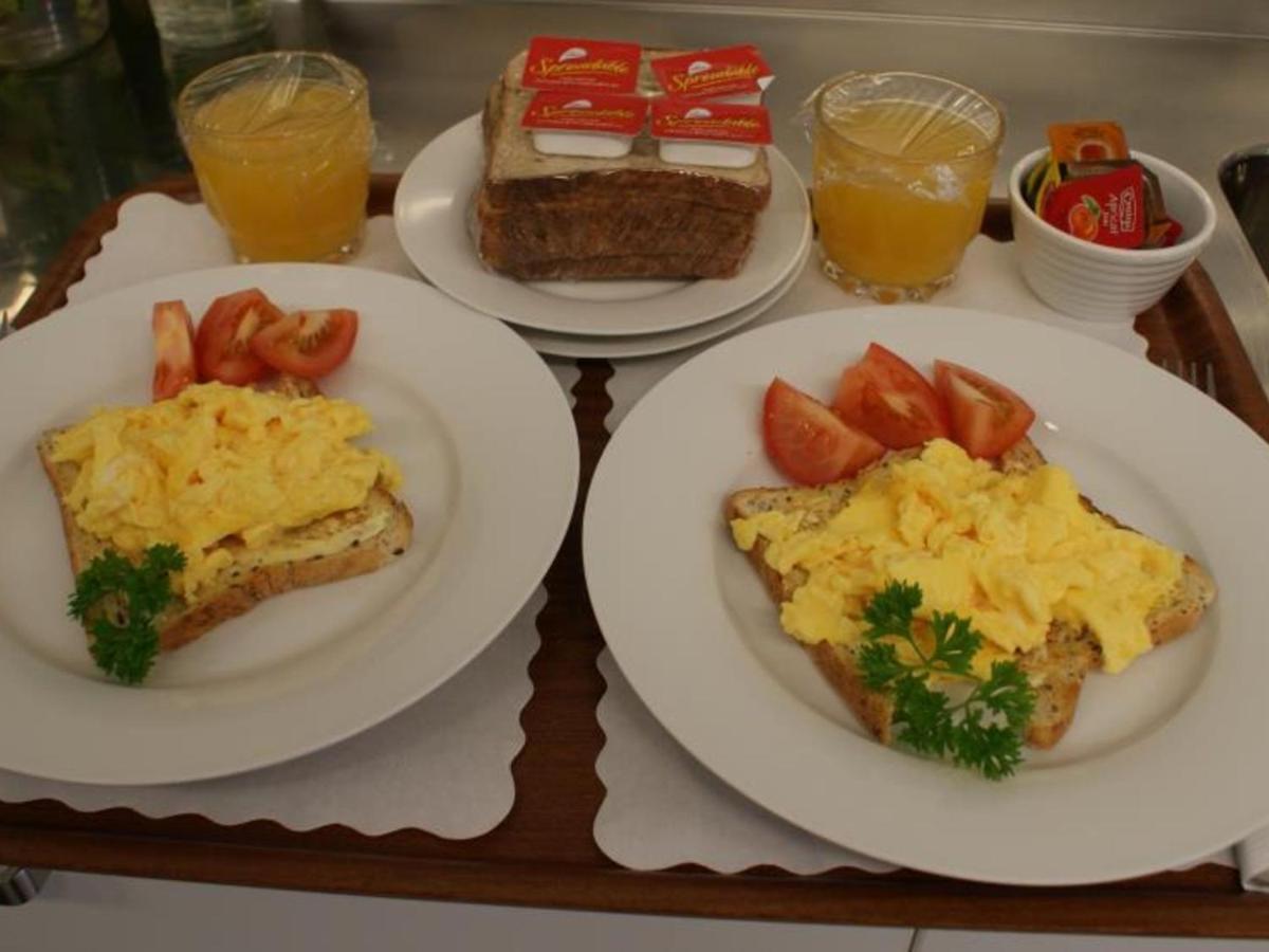 موتيل نيو بلايموث لودج بوكيكورا موتور المظهر الخارجي الصورة Scrambled eggs on toast